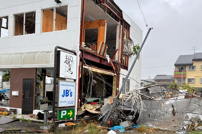 A building with its outer wall torn off in the Hosoe district of Makinohara