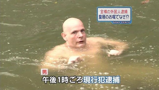 Naked Brit swimming in Imperial Moat in Tokyo