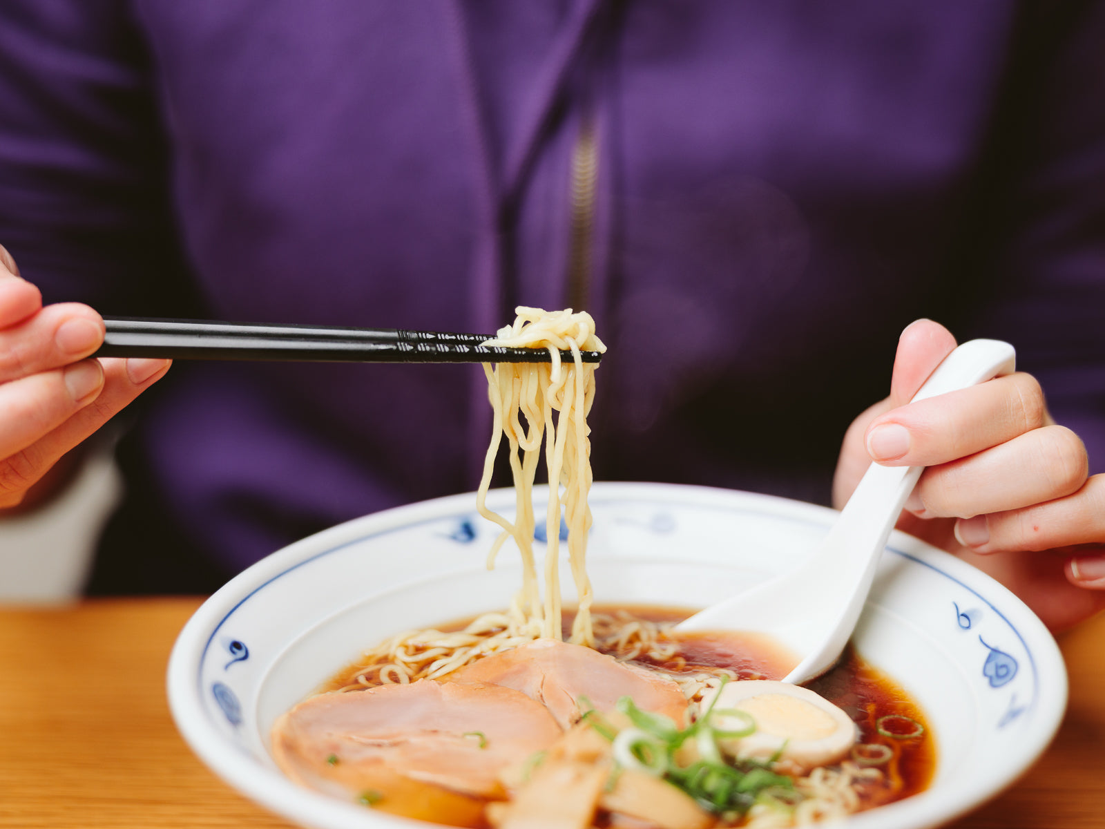 Ramen eaten with spoon