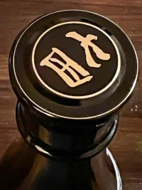 Over-sized sake bottle caps