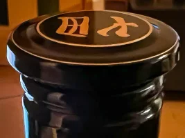 Over-sized sake bottle caps