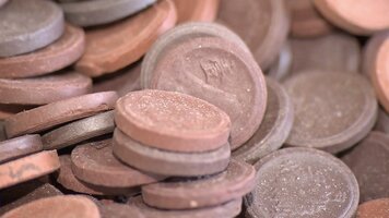 Ceramic 1-sen coins from WWII