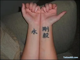 Kanjis-Tattoo-On-Girl-Both-Wrist.webp