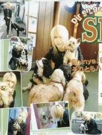 shinya with dogs.webp
