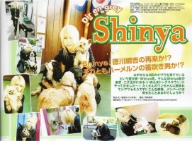 shinya smiling-with dogs.webp shinya smiling-with dogs.webp