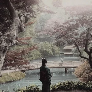 Woman in kimono near river (Hand-colored)