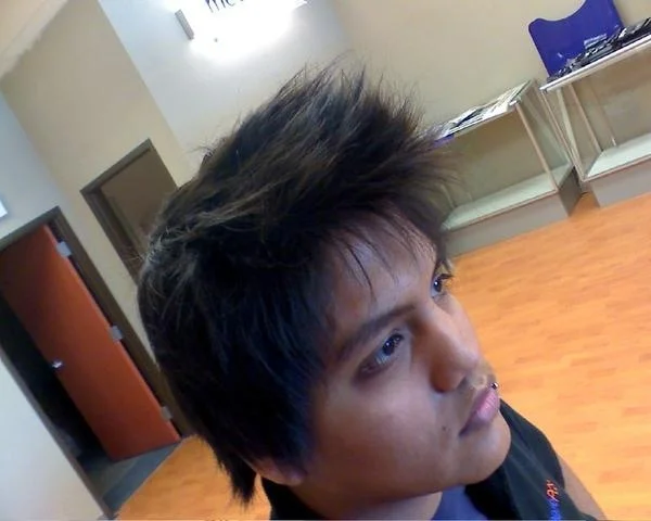 Hmm. . .

That's one weird hair-do. = w =