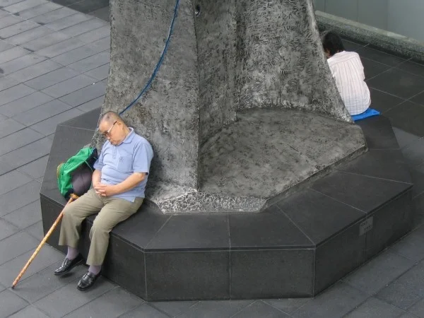 taking a nap at he Kyoto sta.
