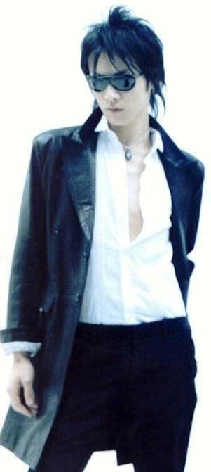 totchi in suit.JPG