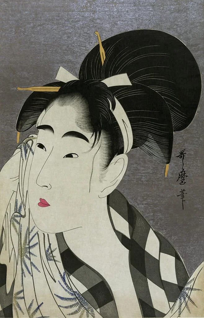 Woman wiping sweat