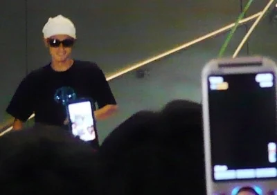 Yosuke helping the Apple store in Shibuya sell the iPhone. Unexpected but understandable.